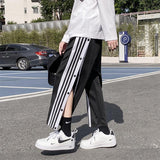 4-Stripe Tearaway Sweatpants