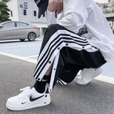 4-Stripe Tearaway Sweatpants